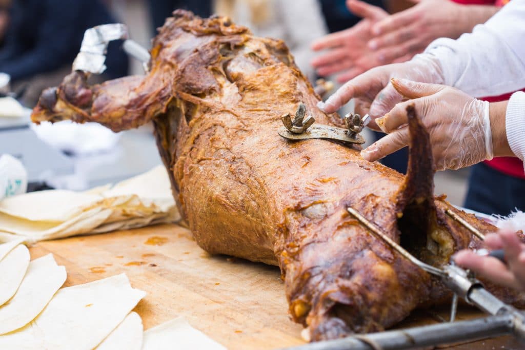 grilled carcass lamb skewers close-up. Delicious Baked Meat at a food Festival